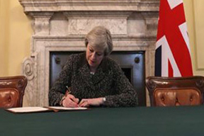 theresa-may-signing-brexit