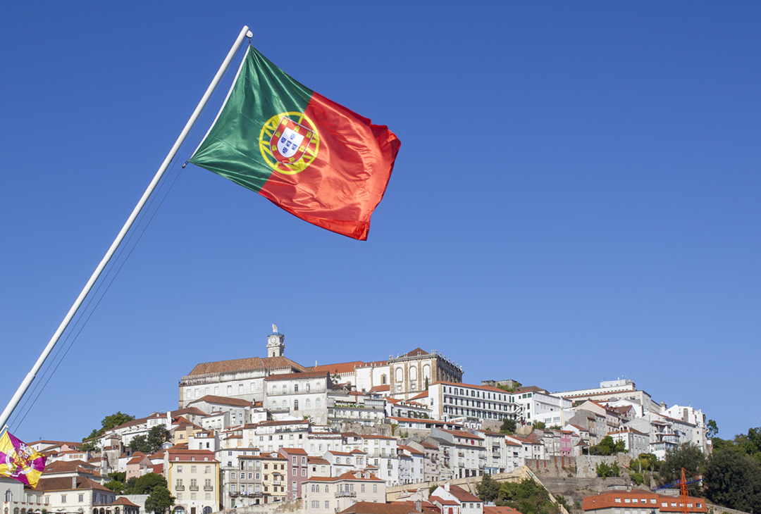Portuguese flag and city view